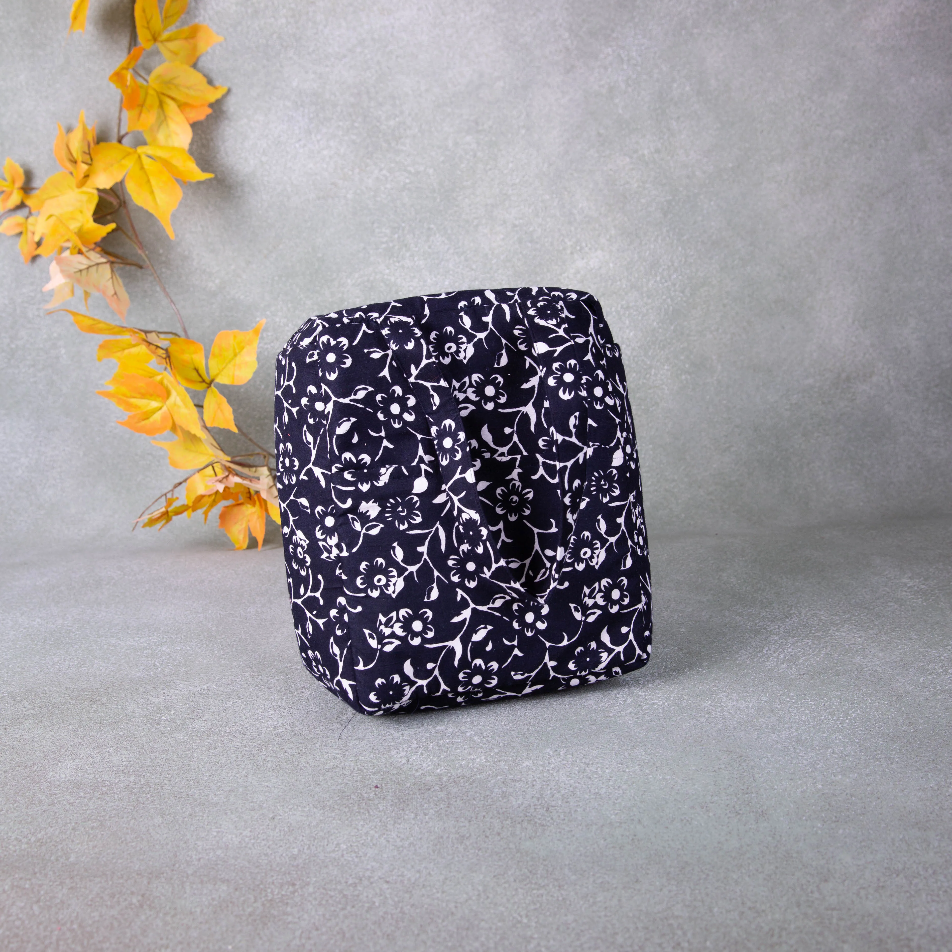 Water Proof Cotton Lunch Bag Black With White Flower Prints.